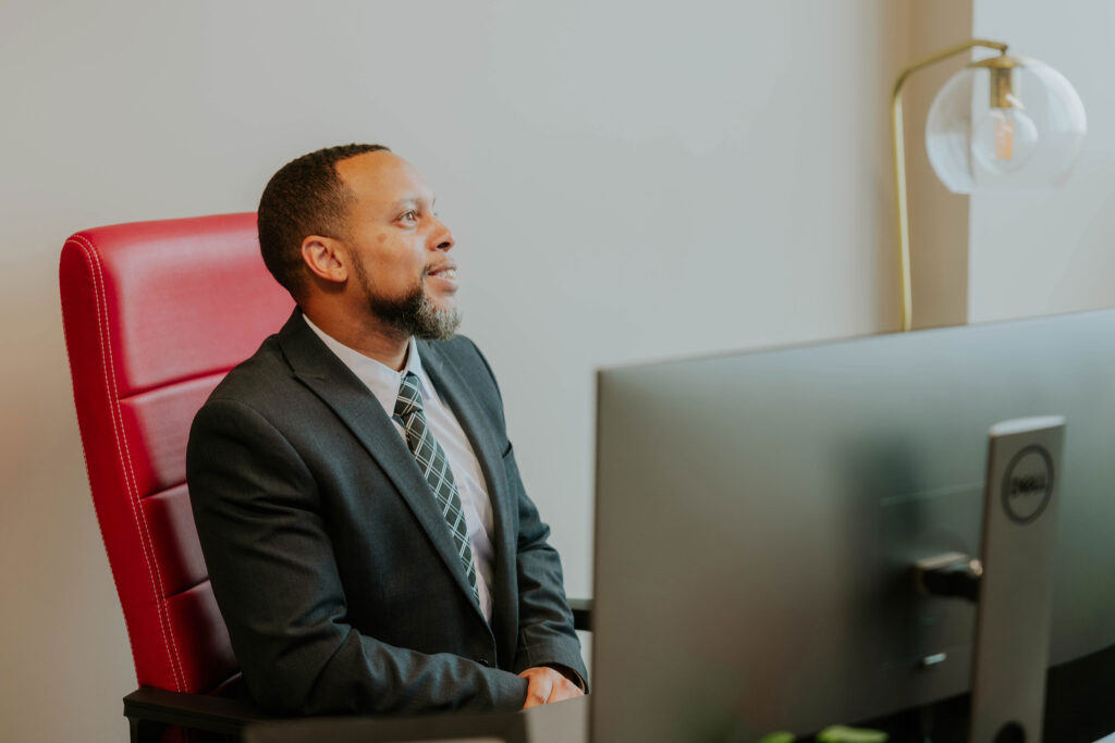 Banking lawyer sitting in office in Omaha