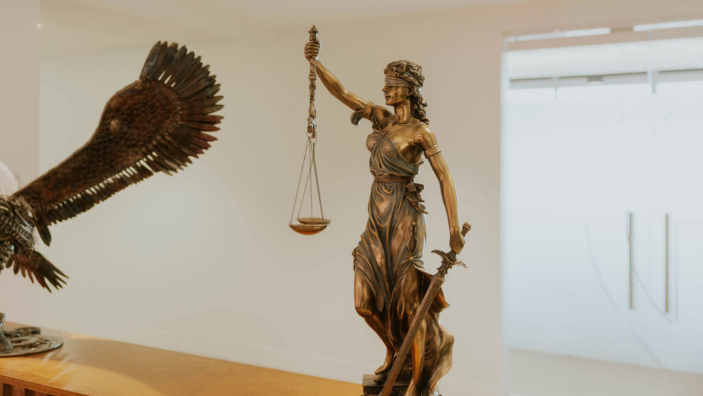 Gold scales of justice statue