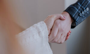 Couple handshaking after legal deal