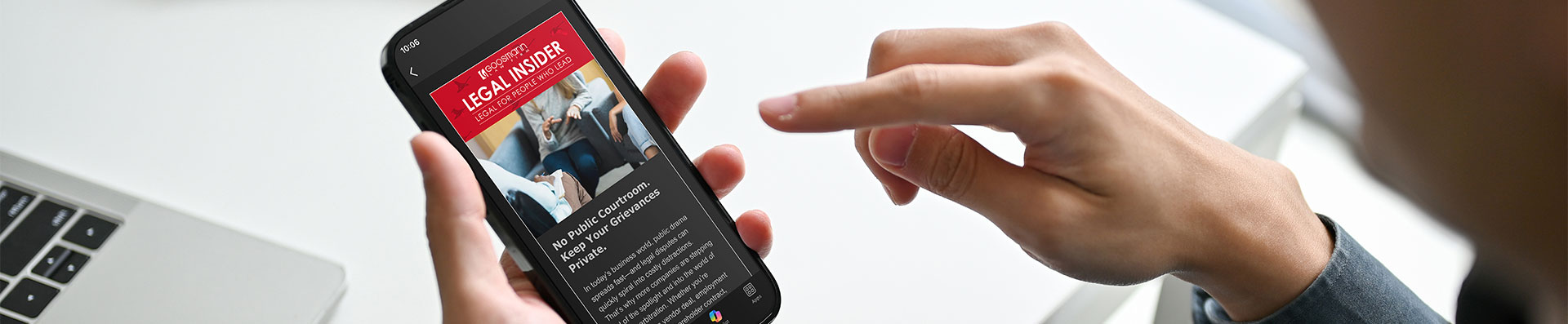 Person reading law article on their phone