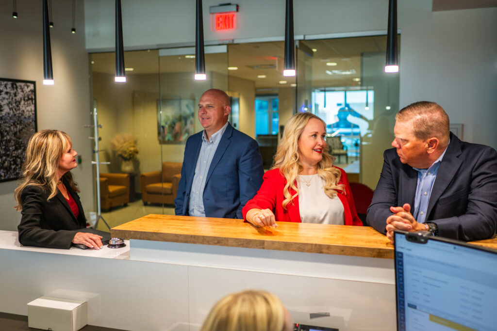 Goosmann team meeting by front desk