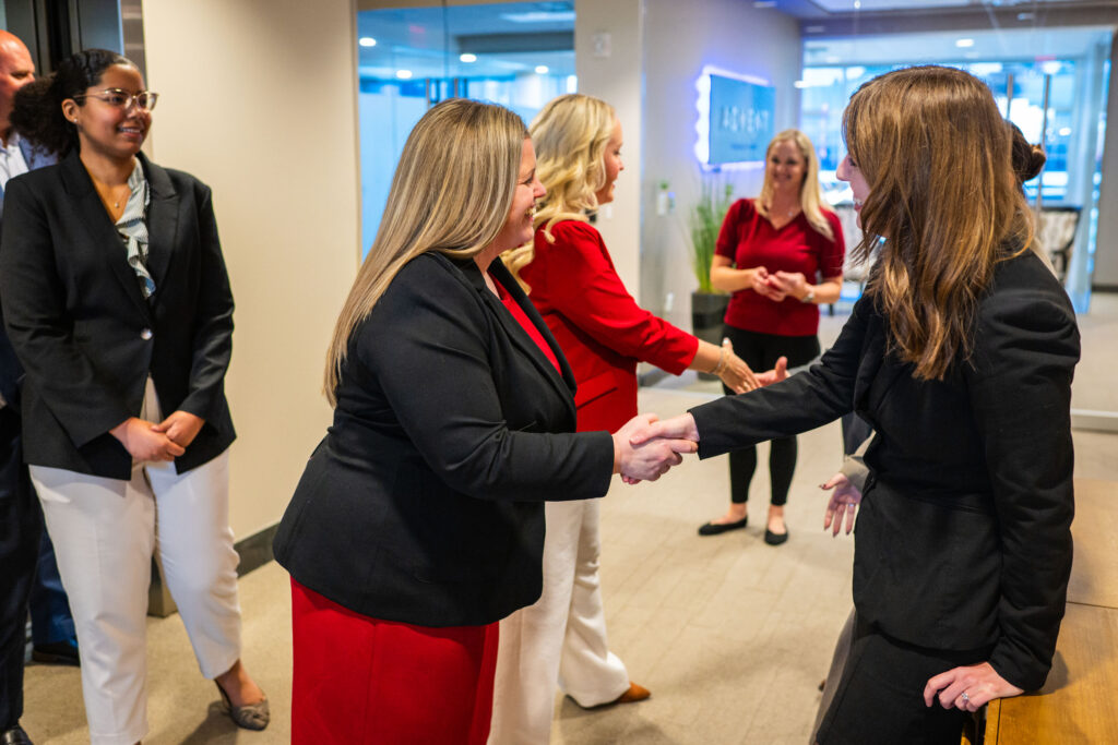 Goosmann members greeting each other