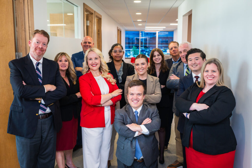 Litigation team at Goosmann standing in hallway