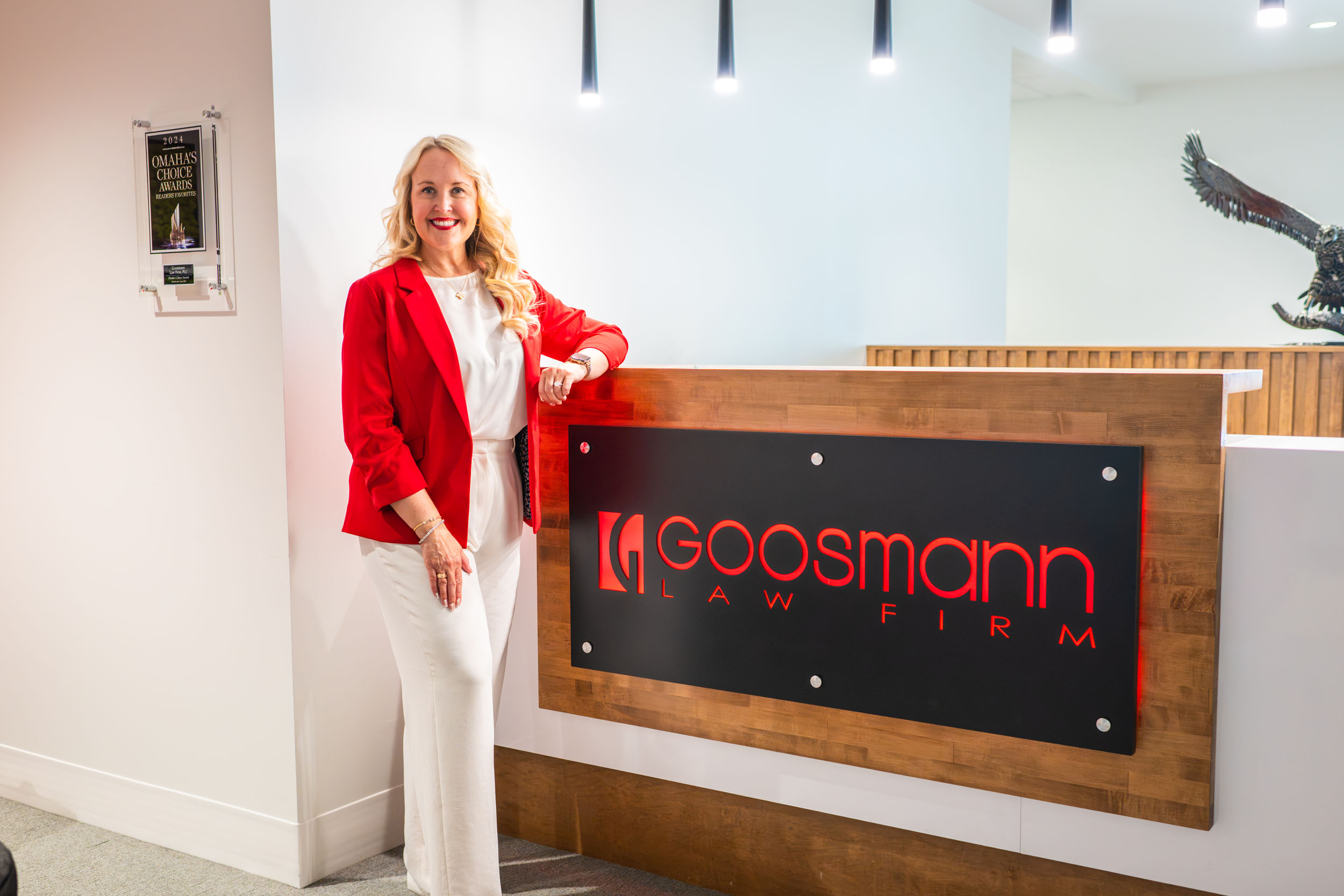 Jeana Goosmann by front desk